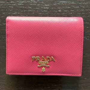 Authentic Prada bi-fold wallet in pink